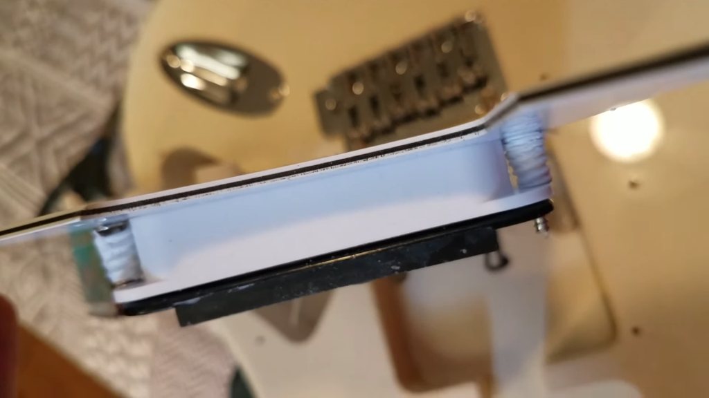 Stratocaster pickup springs covered with Teflon tape